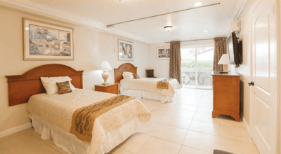 Well-furnished twin bedroom in an assisted living facility