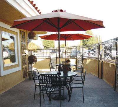 Outdoor patio with tables and umbrellas