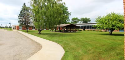 Outdoor space with gazebo and well-maintained lawn