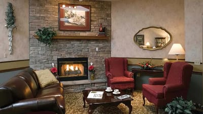 Cozy common area with a fireplace and comfortable seating