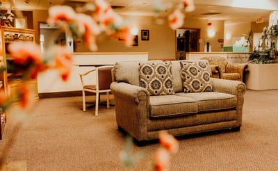 Cozy living room area with a couch and chairs