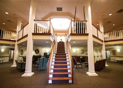Interior view of a facility lobby with stairs