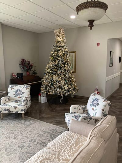 Cozy common area with holiday decorations and furniture