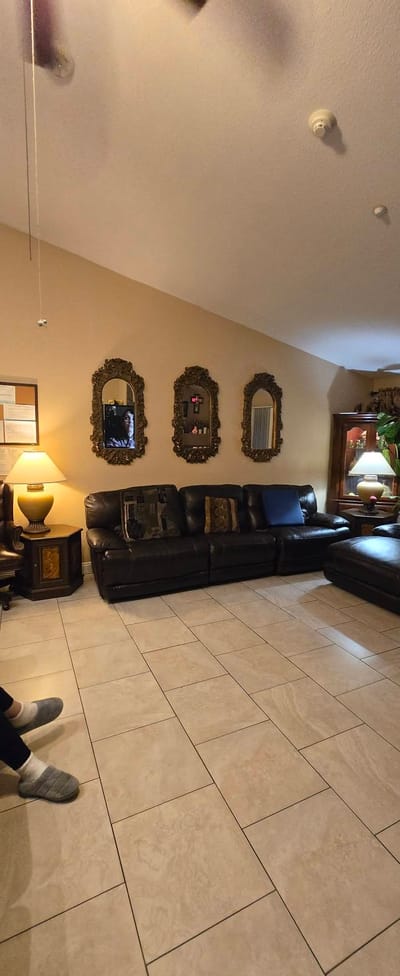 Cozy common area with leather seating and decor