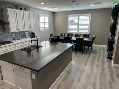 Modern kitchen and dining area in a facility