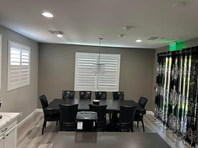 Dining area with a large table and chairs