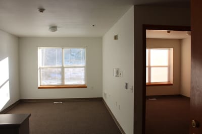 Bright, spacious interior view of a resident room