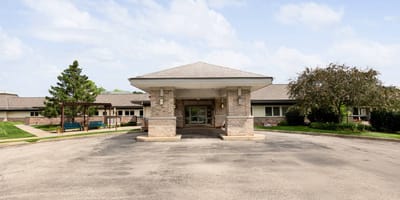 Main entrance of St. Mary's Care Center with landscaping
