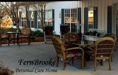 Outdoor patio seating area at Fernbrooke Personal Care Home