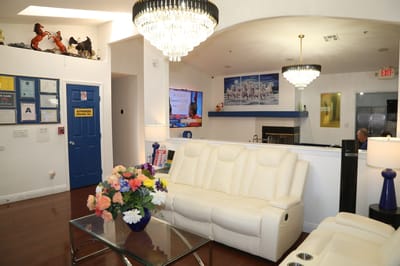 Bright common area with seating and flowers