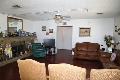 Cozy common area with seating and decorations.
