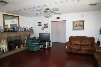 Common area with seating and a fireplace