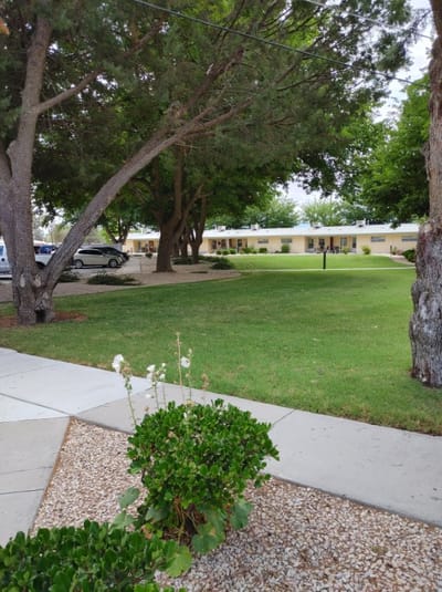 Outdoor view of landscaping and building at the retirement center
