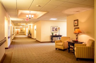 Interior hallway with seating and artwork