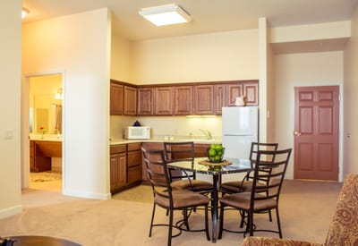 Cozy interior of a resident's apartment with kitchen and dining area