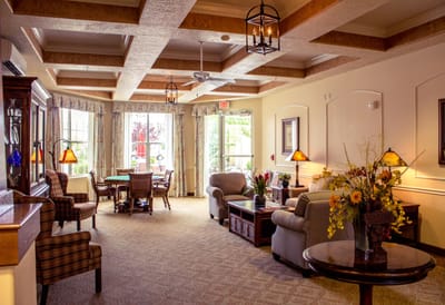 Bright common area with comfortable seating and dining space
