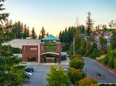 Exterior view of the facility surrounded by trees
