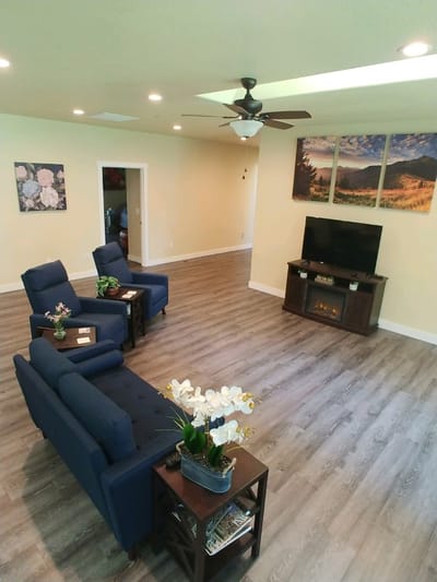 Bright common area with seating and artwork