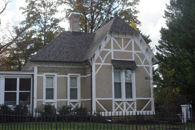 Exterior view of a residential building with a garden