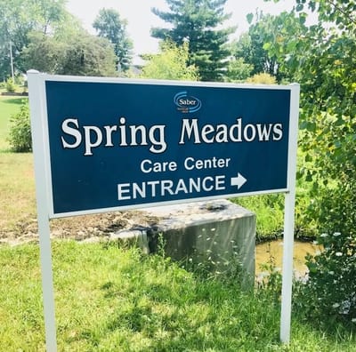 Sign for Spring Meadows Care Center at the entrance