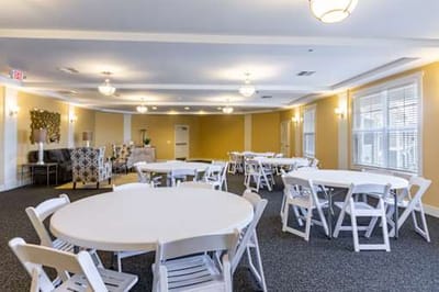 Bright common area with tables and chairs