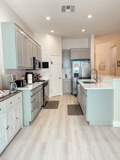 Bright kitchen area with modern appliances