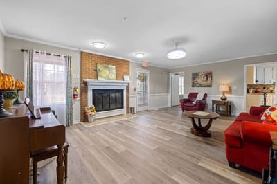 Cozy common area with seating and fireplace
