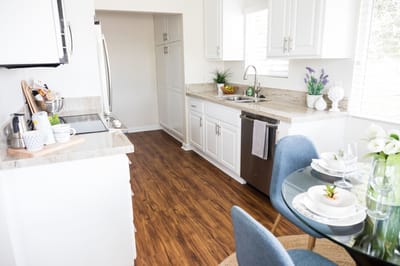 Bright kitchen and dining area in a senior living facility