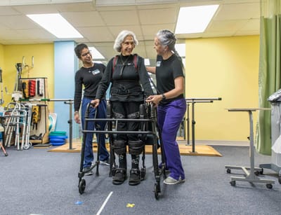 Residents participating in therapy sessions with staff