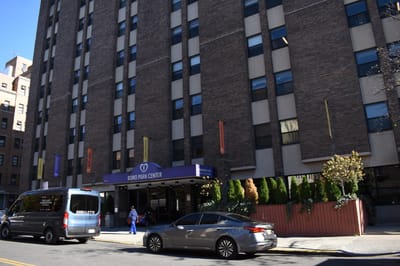 Exterior view of Boro Park Center with a vehicle
