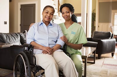 Caregiver with a resident in a common area