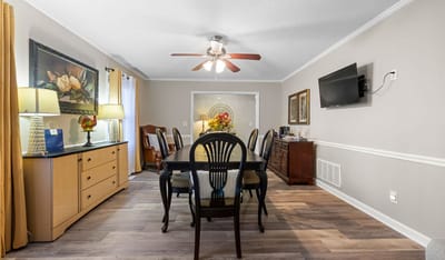 Dining area with a large table and decor