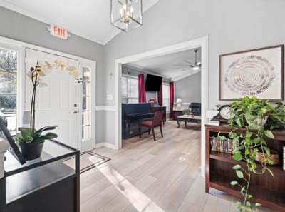 Welcoming lobby area with seating and plants