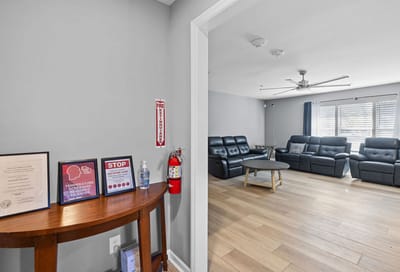 Common area with seating and decor items.