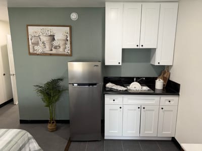 A kitchenette area in a resident room
