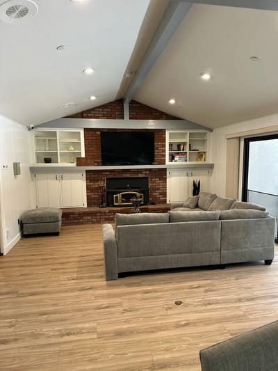 Cozy common area with comfortable seating and TV