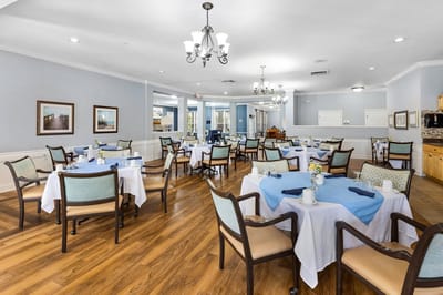 Bright dining room with neatly set tables