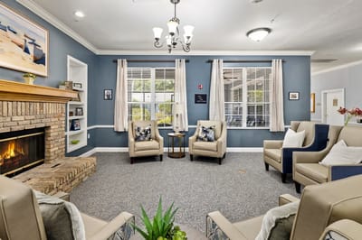 Cozy common area with comfortable seating and a fireplace