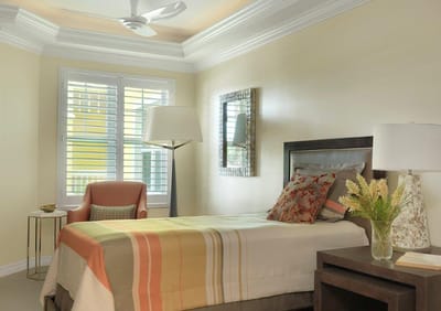 Cozy private resident room with bed and chair