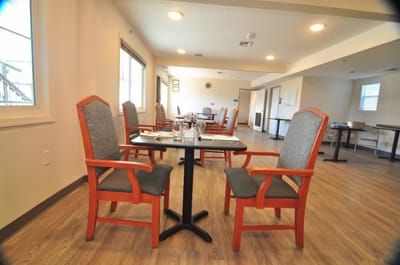 Dining area with neatly arranged tables and chairs