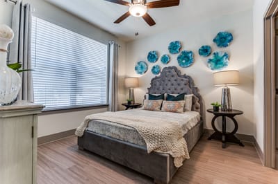 Well-decorated bedroom in a senior living unit