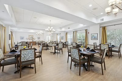 Bright dining area with tables set for meals