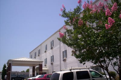Exterior view of a retirement home with flowers