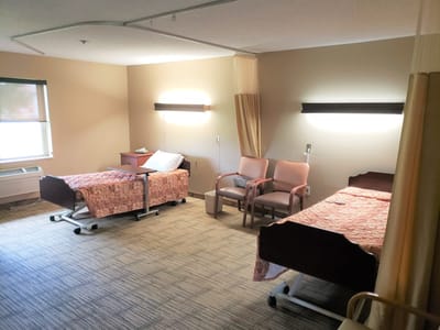 Interior view of a shared resident room with two beds