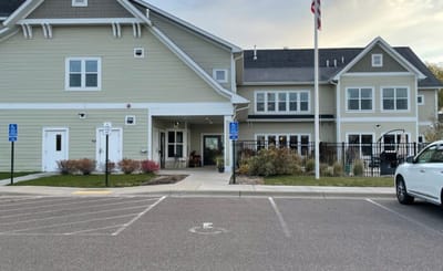 Exterior view of the facility with entrance and landscaping.