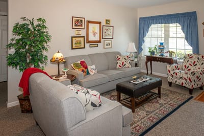 Cozy living area with comfortable furniture and decor.