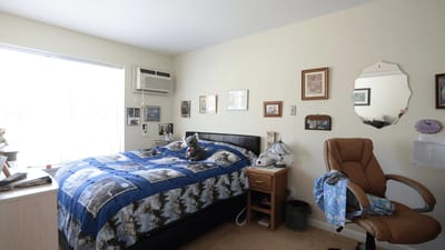 Cozy interior room with a bed and chair