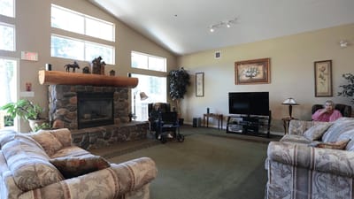 Common area with a fireplace and seating