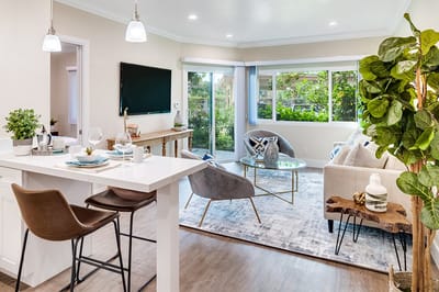 Bright and inviting living area with outdoor view.