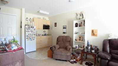 Cozy resident living room with personal decor.
